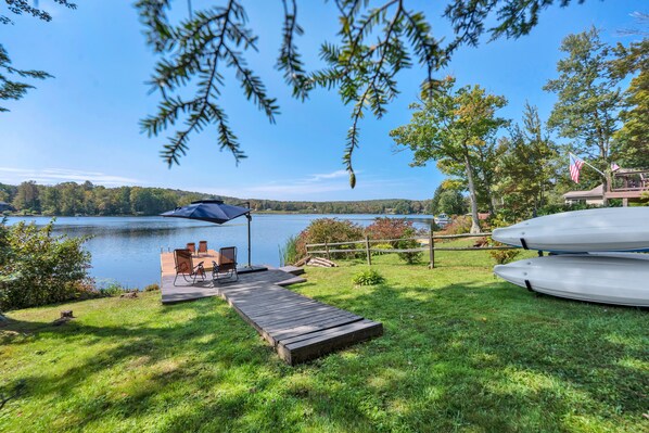 Lakeside Patio: Unwind on the private dock area with stunning water views!

