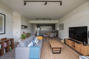 Open plan living dining kitchen area as viewed from balcony