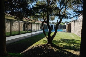 Patio,View (from property/room),Balcony/Terrace,Seating area,Swimming pool