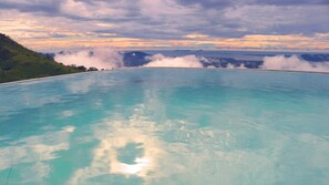 our lotus-petal-shape infinity pool with volcanic filtered mineral water