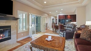 Great room includes access to patio and light all around. 