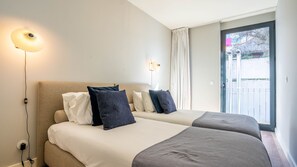 Second bedroom with two single beds. Cozy towels and linen included! #LovelyStay #Airbnb