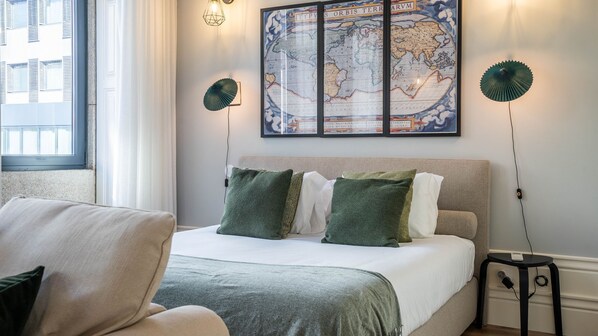 Cozy nights await in our charming bedroom area featuring a double bed and the luxury of air conditioning. Sweet dreams guaranteed! #AC #Comfort