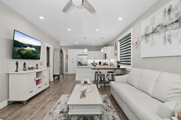 Modern and stylish living room with an open concept.