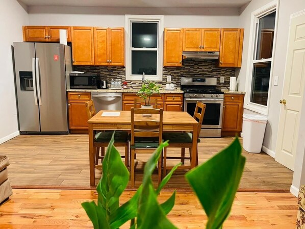 Fully equipped kitchen with dining area. 