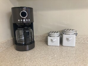 Coffee, sugar is provided.