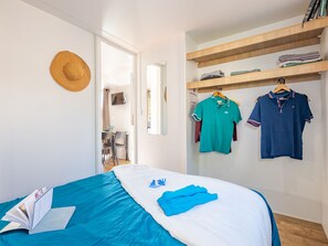 Warm and comfortable bedroom with plush bedding and soft accents to ensure a restful night's sleep.