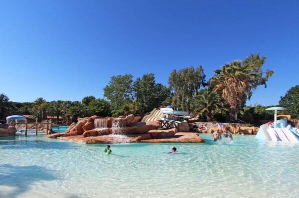 Expansive shallow pool area, perfect for children to splash and play safely.