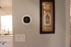 Living area smart thermostat, adjustable to keep you comfortable