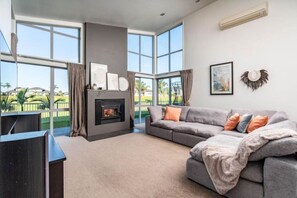 Comfortable lounge area looking out on to golf course