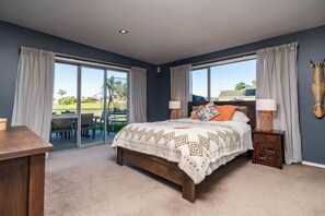 Master bedroom looking out on to golf course