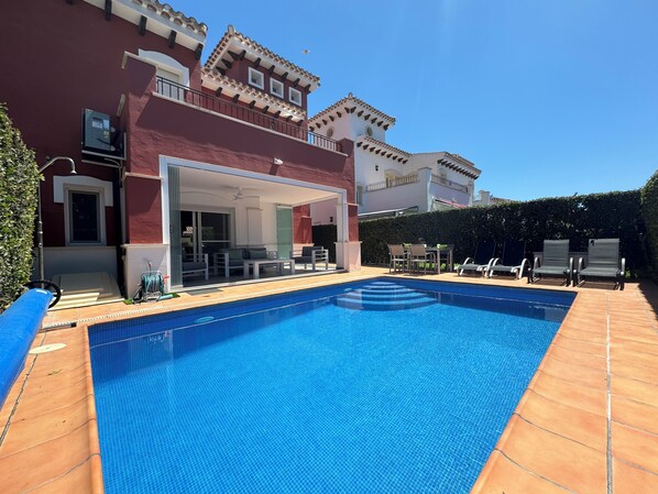 Heated pool with sunny patio area ☀️