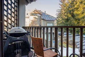 Patio w/ outdoor seating and BBQ