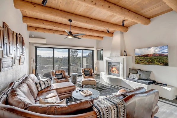 Living Room with High Wood Beam Ceilings!