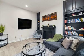 Our chic living room is the perfect place to unwind after a day of exploring!
