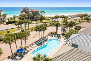 Seasonally heated pool is steps from the beach!