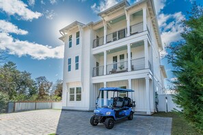 6-seater golf cart at Ovation simplifies beach gear transport!