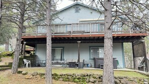 Two levels of decks that includes a Hot Tub.