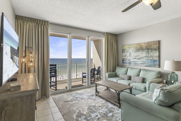 Spacious living area with plenty of seating, Queen sleeper sofa, Gulf views, 65" Smart TV with easy access to Roku, Prime TV, Netflix, and more!