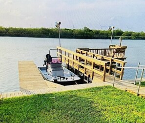 Fishing dock, cleaning station with boat slip