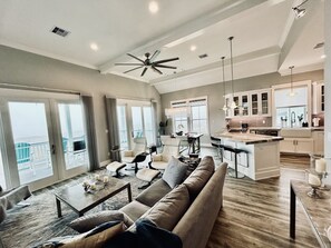 Living room and kitchen area of home.