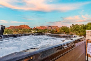 After exploring the red rocks, unwind, soothe sore muscles, and take in the breathtaking views!
