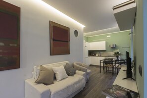 Living room with sofa bed and TV