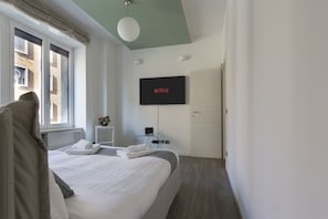 Bedroom with window overlooking Corso del Rinascimento