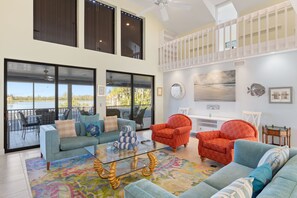 Stunning living room overlooking lake and golf course