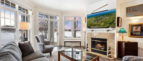Relax in cozy comfort with an indoor fireplace and sleeper sofa for additional guests. Enjoy views of the grounds and outdoor seating on your own private deck/patio. 