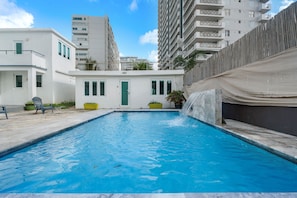 Experience urban tranquility in our private pool oasis