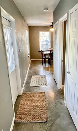 View down first hallway, standing in queen bedroom doorway!