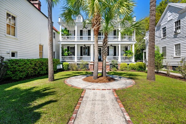 Welcome to your downtown charleston rental! Explore all things downtown by foot! Pictured is the larger front house.