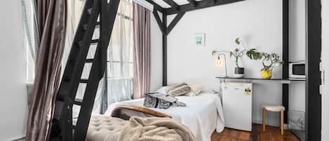a lovely black and white studio loft.