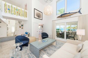 Sun room with vaulted ceilings.