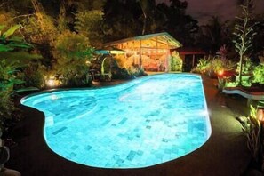 Romantic night view of the massive pool