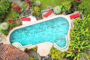 Massive swimming pool is right beside the river!