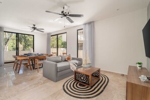 Discover the perfect setting for gatherings – our living room and dining area, a harmonious space for shared moments.