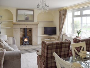 Welcoming living and dining room with wood burner | Rudda Farm Cottage - Rudda Farm Cottages, Staintondale, near Whitby