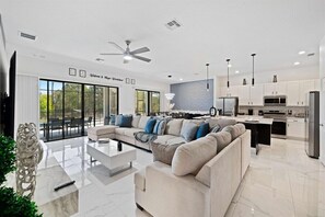 Living space sitting Area With Kitchen View