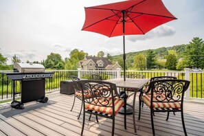 Huge deck with outdoor dining/seating and propane BBQ