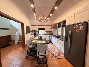 Kitchen has island seating for 5.