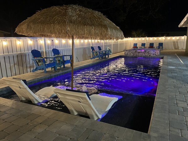 Large pool and spa with great night lighting