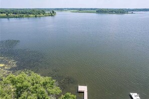 aerial view of lake and dock 