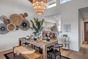 Dining Room accented by a bohemian-style chandelier