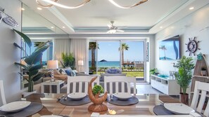 Stylish dining table with custom lighting and a real beach vibe.