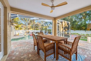 Seamless Indoor-Outdoor Living: Lounge in Luxury by the Poolside Living Room