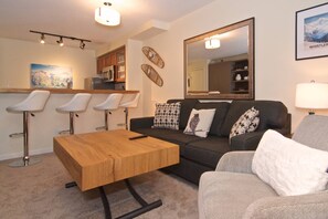 Comfortable new furniture, 4 bar stools and sofa and coffee table/combo dining extension table