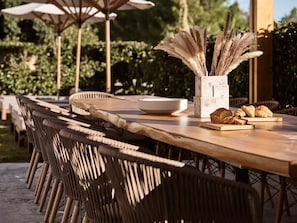 Outdoor settings, ideal for relaxed al fresco dining.  
