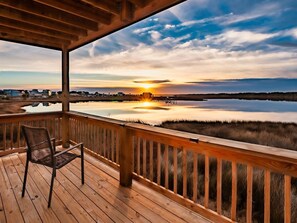 he lower deck is a serene retreat with unbeatable sunset views over the water.